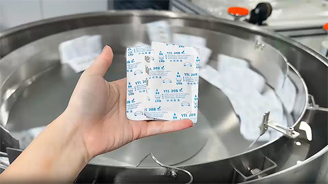 Máquina de inspección y embalaje
