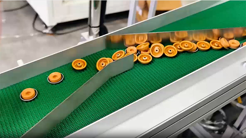 Clasificadora óptica en línea para tapas de botellas